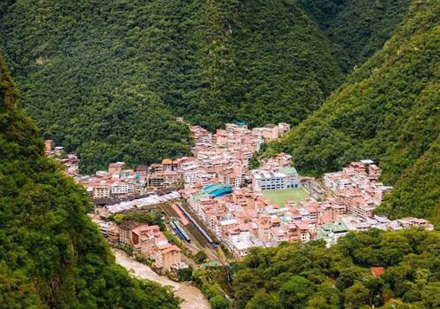 Aerial view of Aguas Calientes town in the valley below Machu Picchu