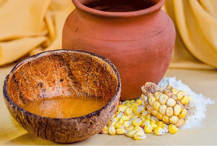 Traditional Chicha de Jora served in a clay cup with fermented corn and Andean cultural setting in Peru
,5 Exotic Drinks